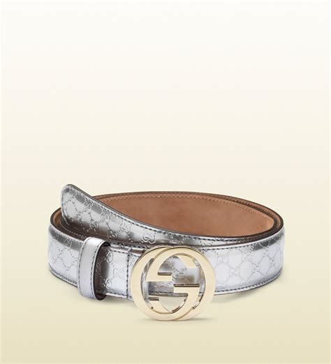 silver buckle Gucci belt